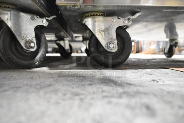 BRAND NEW SCRATCH AND DENT!  2018 Migali C-1R-HC Stainless Steel Commercial Single Door Reach In Freezer w/ Poly Coated Racks on Commercial Casters. Serial C-1R-HC00318071000920006. 115 Volts, 1 Phase. Tested and Working! - Image 4 of 6