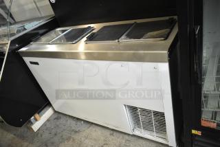 BRAND NEW SCRATCH AND DENT! Master-Bilt DC-4S Stainless Steel Commercial Chest Freezer w/ 2 Center Hinge Lids on Commercial Casters.  115 Volts, 1 Phase. Tested and Working!