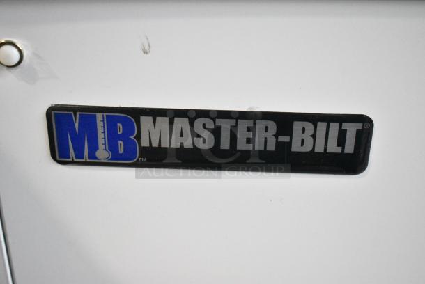 BRAND NEW SCRATCH AND DENT! Master-Bilt DC-4S Stainless Steel Commercial Chest Freezer w/ 2 Center Hinge Lids on Commercial Casters.  115 Volts, 1 Phase. Tested and Working! - Image 2 of 12