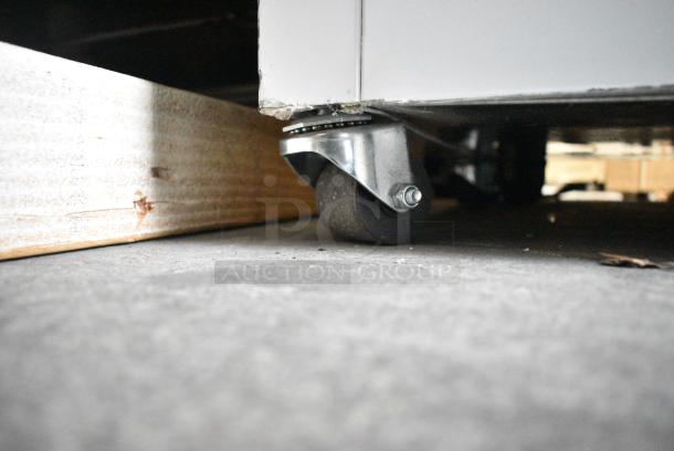 BRAND NEW SCRATCH AND DENT! Master-Bilt DC-4S Stainless Steel Commercial Chest Freezer w/ 2 Center Hinge Lids on Commercial Casters.  115 Volts, 1 Phase. Tested and Working! - Image 3 of 12