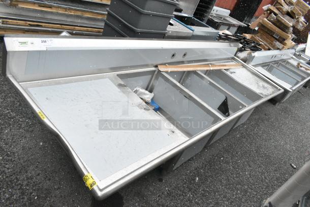 BRAND NEW SCRATCH AND DENT! Regency 600S32030230 124" 16-Gauge Stainless Steel Three Compartment Commercial Sink with 2 Drainboards - 20" x 30" x 14" Bowls - Image 1 of 7