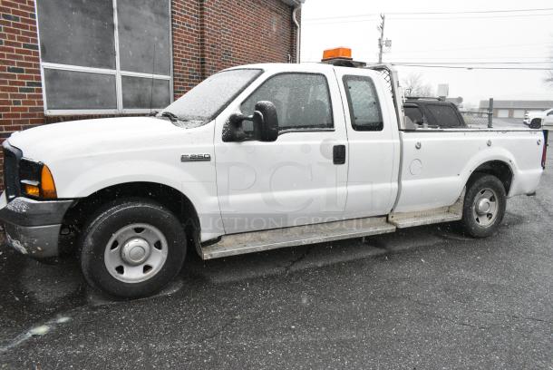 2006 Ford F250 Super Duty 2WD Pick Up Truck w/ Crew Cab, Headache Guard and Tommy Gate PUW60-1340S38TP4 liftgate. VIN 1FTSX20566ED68092. Title In Hand. Needs a Timing Chain. Vehicle Runs and Drives But Needs a New Battery; Will Need To Be Jump Started. - Image 1 of 13