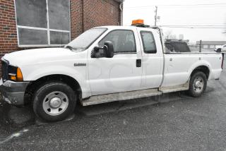 2006 Ford F250 Super Duty 2WD Pick Up Truck w/ Crew Cab, Headache Guard and Tommy Gate PUW60-1340S38TP4 liftgate. VIN 1FTSX20566ED68092. Title In Hand. Needs a Timing Chain. Vehicle Runs and Drives But Needs a New Battery; Will Need To Be Jump Started.
