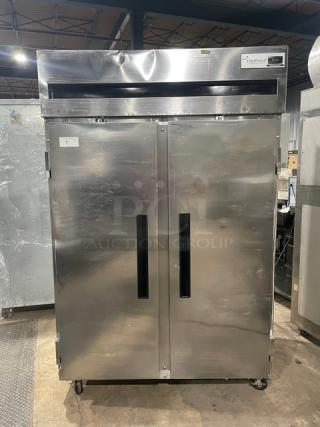Delfield Commercial Stainless Steel Solid Double Door Reach In Refrigerator! With Poly Coated Wire Racks! Model: 6051XL-S SN: 1204152001884! 115V 1 Phase! On Casters!