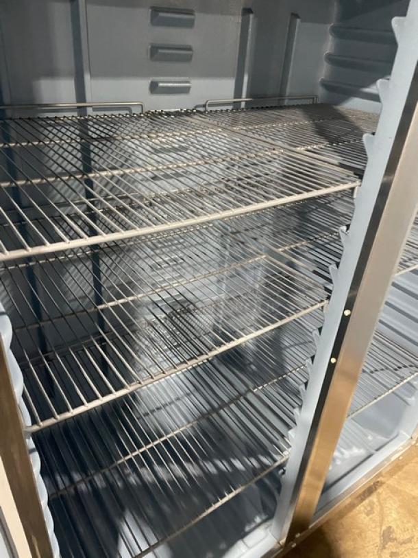Delfield Commercial Stainless Steel Solid Double Door Reach In Refrigerator! With Poly Coated Wire Racks! Model: 6051XL-S SN: 1204152001884! 115V 1 Phase! On Casters! - Image 6 of 10