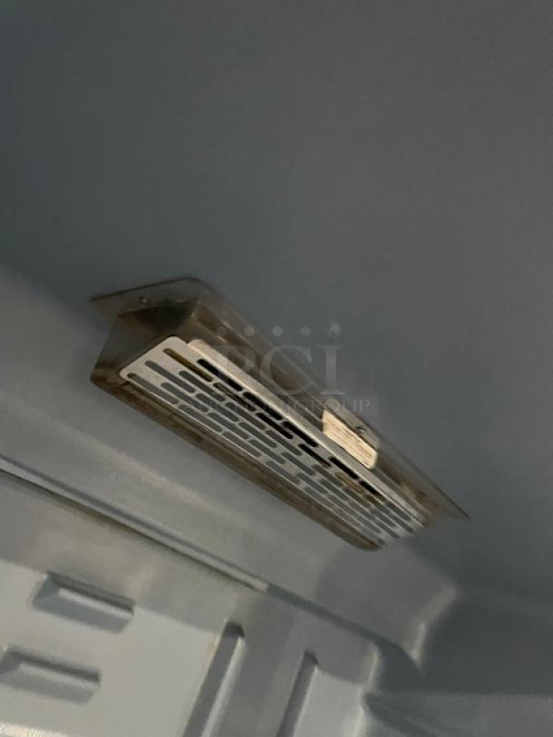 Delfield Commercial Stainless Steel Solid Double Door Reach In Refrigerator! With Poly Coated Wire Racks! Model: 6051XL-S SN: 1204152001884! 115V 1 Phase! On Casters! - Image 7 of 10