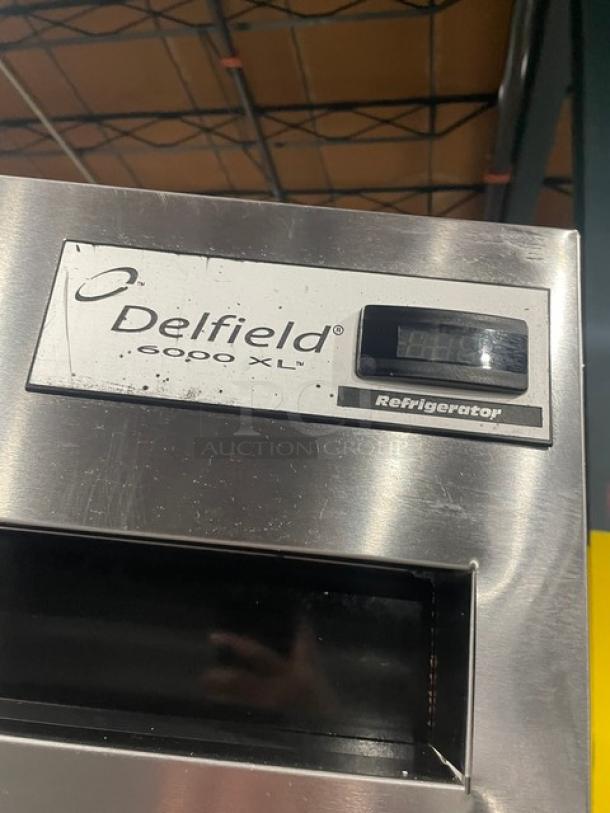 Delfield Commercial Stainless Steel Solid Double Door Reach In Refrigerator! With Poly Coated Wire Racks! Model: 6051XL-S SN: 1204152001884! 115V 1 Phase! On Casters! - Image 9 of 10