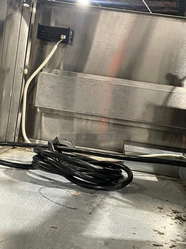 Delfield Commercial Stainless Steel Solid Double Door Reach In Refrigerator! With Poly Coated Wire Racks! Model: 6051XL-S SN: 1204152001884! 115V 1 Phase! On Casters! - Image 10 of 10