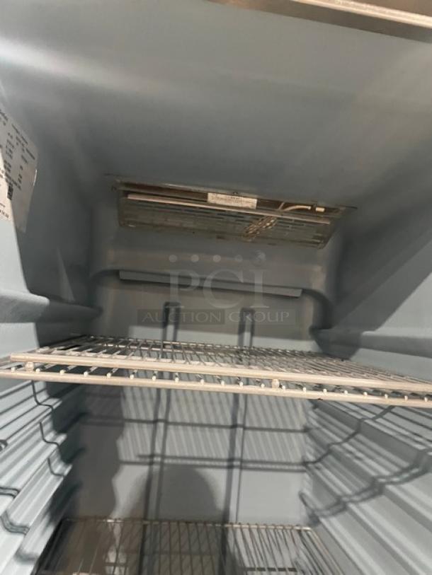 Delfield Commercial Stainless Steel Solid Half Door Single Section Reach-In Freezer! With Poly Coated Wire Racks! Model: 6125XL-SH SN: 1404152002368! 115V 1 Phase! On Casters! - Image 6 of 9