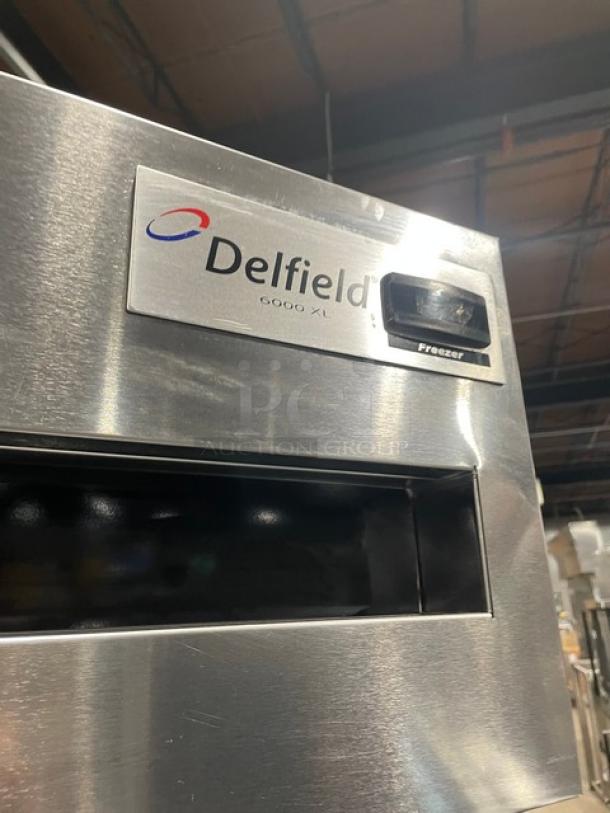 Delfield Commercial Stainless Steel Solid Half Door Single Section Reach-In Freezer! With Poly Coated Wire Racks! Model: 6125XL-SH SN: 1404152002368! 115V 1 Phase! On Casters! - Image 8 of 9