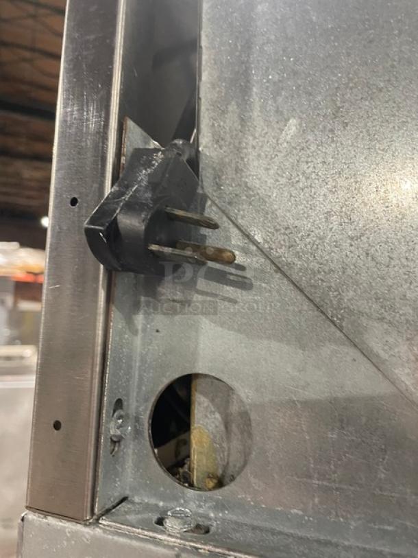 Delfield Commercial Stainless Steel Solid Half Door Single Section Reach-In Freezer! With Poly Coated Wire Racks! Model: 6125XL-SH SN: 1404152002368! 115V 1 Phase! On Casters! - Image 9 of 9