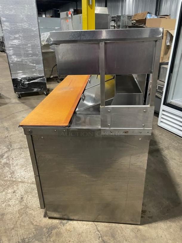 Delfield Commercial Stainless Steel 4 Drawer Refrigerated Mega Top Salad/Sandwich Prep Table! With Enclosed Storage Base Type Shelf Overhead! With Wooden Chopping Block Style Workstation! Model: UCD4464N-12-DD5 SN: 1303152000466! 115V 1Phase! - Image 3 of 10