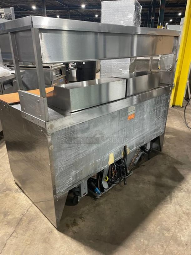 Delfield Commercial Stainless Steel 4 Drawer Refrigerated Mega Top Salad/Sandwich Prep Table! With Enclosed Storage Base Type Shelf Overhead! With Wooden Chopping Block Style Workstation! Model: UCD4464N-12-DD5 SN: 1303152000466! 115V 1Phase! - Image 4 of 10