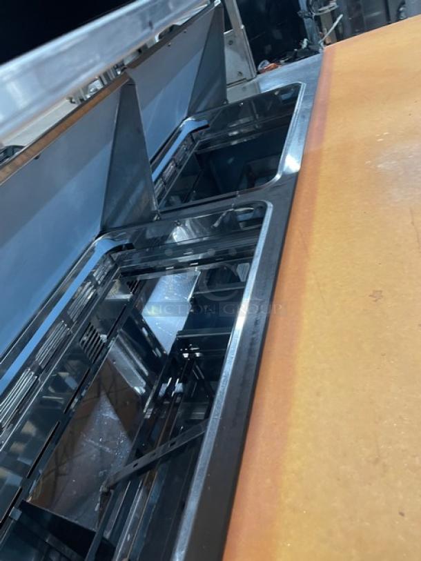 Delfield Commercial Stainless Steel 4 Drawer Refrigerated Mega Top Salad/Sandwich Prep Table! With Enclosed Storage Base Type Shelf Overhead! With Wooden Chopping Block Style Workstation! Model: UCD4464N-12-DD5 SN: 1303152000466! 115V 1Phase! - Image 6 of 10