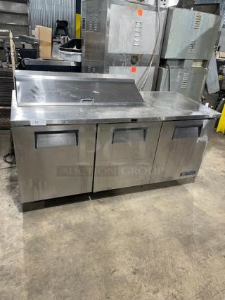 True Commercial Stainless Steel 3 Door Refrigerated Mega Top Salad/Sandwich Prep Table! With Poly Coated Wire Racks! Model: TSSU-72-12 SN: 7868756! 115V 1 Phase! On Casters! - Item #1155757