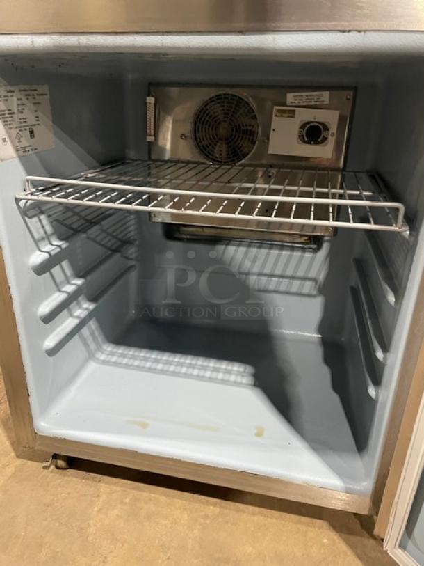 Delfield Commercial Stainless Steel Solid Single Door Undercounter Reach In Refrigerator! With Poly Coated Wire Rack! Model: 406CA-DD1 SN: 1309152001183! 115V 1 Phase! On Casters! - Image 5 of 7