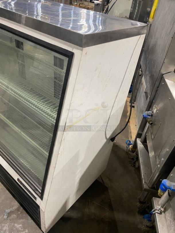 True Commercial Slanted Glass Single Duty Refrigerated Deli Display Merchandiser Case! With Poly Coated Racks! With Rear Double Sliding Glass Doors! Model: TSID-72-3 SN: 1-4377737! 115V 1 Phase! On Casters! - Image 2 of 9