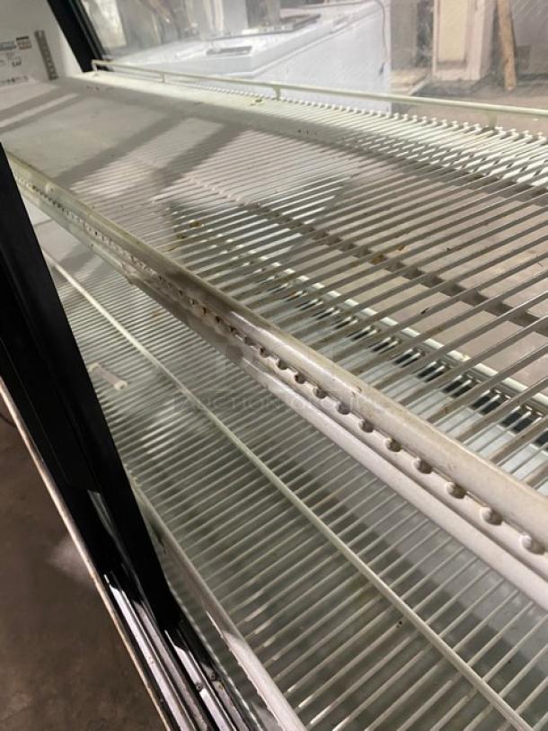 True Commercial Slanted Glass Single Duty Refrigerated Deli Display Merchandiser Case! With Poly Coated Racks! With Rear Double Sliding Glass Doors! Model: TSID-72-3 SN: 1-4377737! 115V 1 Phase! On Casters! - Image 5 of 9