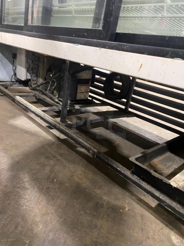 True Commercial Slanted Glass Single Duty Refrigerated Deli Display Merchandiser Case! With Poly Coated Racks! With Rear Double Sliding Glass Doors! Model: TSID-72-3 SN: 1-4377737! 115V 1 Phase! On Casters! - Image 8 of 9
