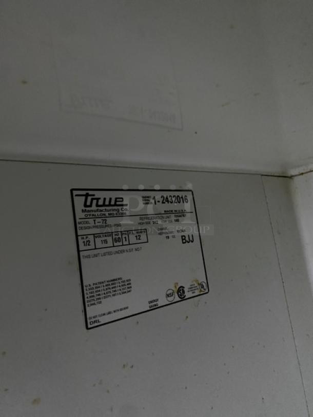 True Commercial Stainless Steel Solid 3 Door Reach In Refrigerator! With Poly Coated Wire Racks! Model: T-72 SN: 1-2432016! 115V 1 Phase! On Casters! Working When Removed! - Image 7 of 8