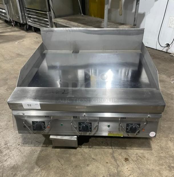 Brand New! Garland CG Series Commercial Stainless Steel Natural Gas Powered Mirror-Shine Polished Countertop Flat Griddle! With Back & Side Splashes! With Thermostatic Controls! On Legs! - Image 1 of 9