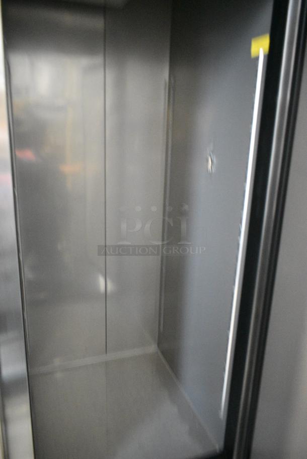 BRAND NEW SCRATCH AND DENT! 2023 Avantco 447AP49F 55 3/8" Stainless Steel Solid Door Reach-In Freezer. 115 Volts, 1 Phase. Tested and Working! - Image 4 of 6