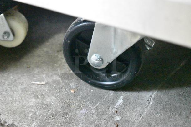 BRAND NEW SCRATCH AND DENT! 2023 Avantco 447AP49F 55 3/8" Stainless Steel Solid Door Reach-In Freezer. 115 Volts, 1 Phase. Tested and Working! - Image 5 of 6
