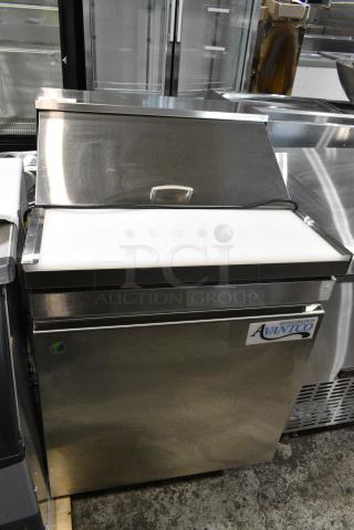 BRAND NEW SCRATCH AND DENT! 2021 Avantco 447APST27 27" 1 Door Stainless Steel Refrigerated Sandwich / Salad Prep Table on Commercial Casters. 115 Volts, 1 Phase. Tested and Powers On But Does Not Get Cold