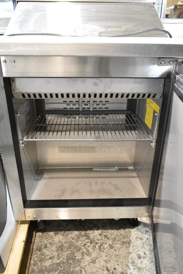BRAND NEW SCRATCH AND DENT! 2021 Avantco 447APST27 27" 1 Door Stainless Steel Refrigerated Sandwich / Salad Prep Table on Commercial Casters. 115 Volts, 1 Phase. Tested and Powers On But Does Not Get Cold - Image 5 of 6