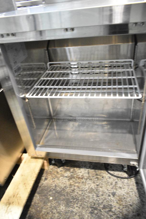 BRAND NEW SCRATCH AND DENT! 2024 Avantco 178TUC27R Stainless Steel 27" Undercounter Refrigerator on Commercial Casters. 115 Volts, 1 Phase. Tested and Powers On But Does Not Get Cold - Image 4 of 6