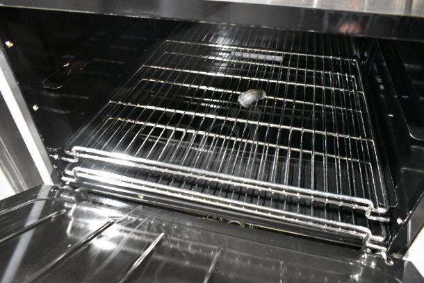 CookRite Stainless Steel Commercial Natural Gas Powered Flat Top Griddle w/ Oven, Over Shelf and Back Splash on Commercial Casters. - Image 5 of 6