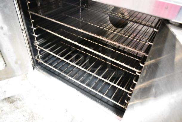 Garland SunFire Stainless Steel Commercial Natural Gas Powered Full Size Convection Oven w/ Solid Door, View Through Door, Thermostatic Controls and Metal Oven Racks. - Image 4 of 5