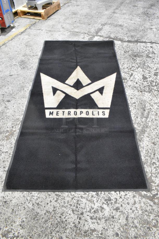 Black Floor Mat w/ Metropolis Logo. - Image 1 of 2