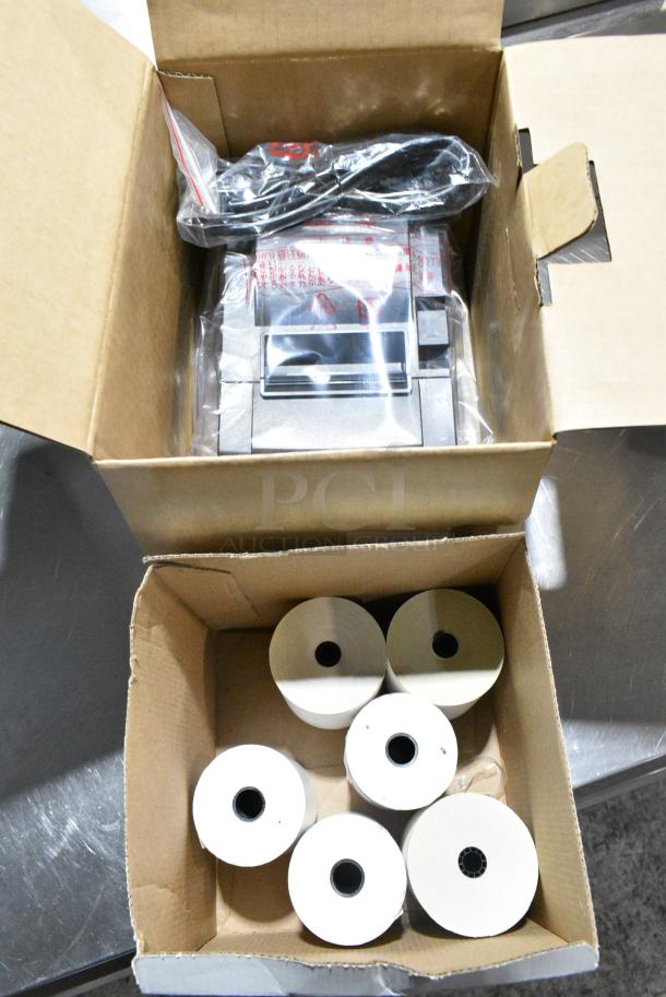 2 Various Items Including Star TSP100 Receipt Printer and Receipt Printer Rolls. 2 Times Your Bid! - Image 1 of 3