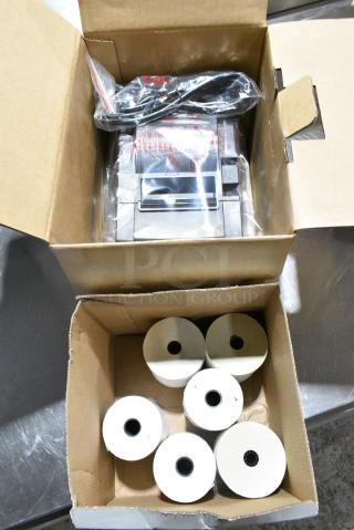 2 Various Items Including Star TSP100 Receipt Printer and Receipt Printer Rolls. 2 Times Your Bid!