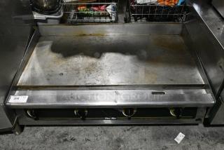 Star Ultra Max Stainless Steel Commercial Countertop Natural Gas Powered Flat Top Griddle.