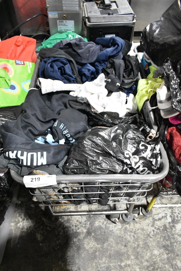 Metal Laundry Cart on Commercial Casters w/ Contents Including Clothing. - Image 1 of 2