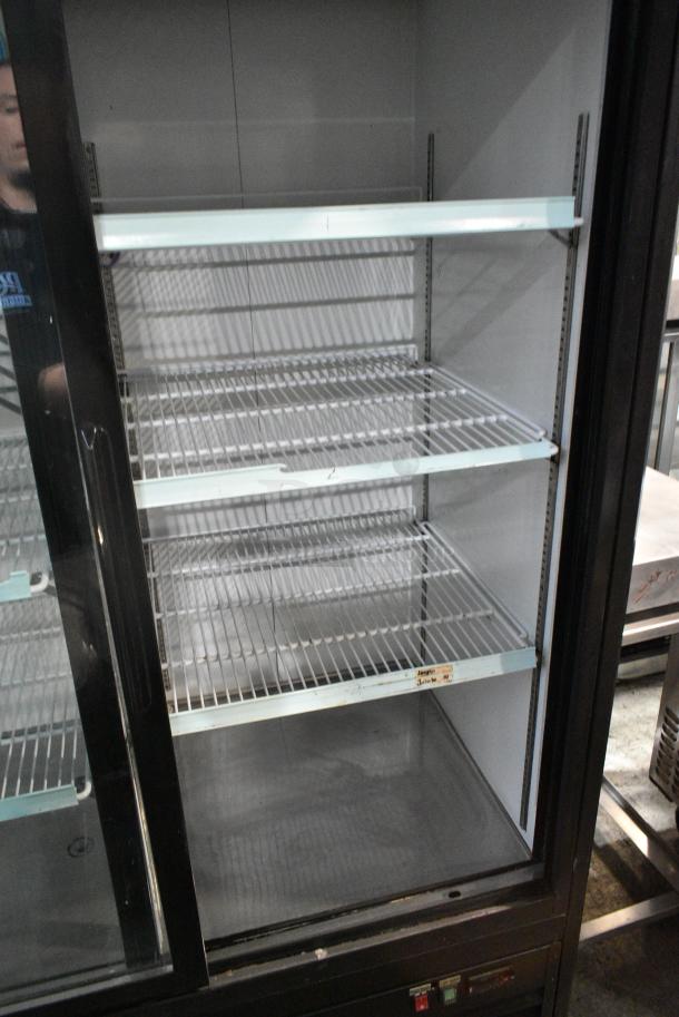 Avantco 178GDS47HCB Metal Commercial 2 Door Reach In Cooler Merchandiser w/ Poly Coated Racks on Commercial Casters. 115 Volts, 1 Phase. Tested and Working! - Image 4 of 5