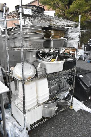 Chrome Finish 5 Tier Wire Shelving Unit w/ Contents Including Stainless Steel Drop In Bins, Poly Bins and Stock Pots. BUYER MUST DISMANTLE. PCI CANNOT DISMANTLE FOR SHIPPING. PLEASE CONSIDER FREIGHT CHARGES.