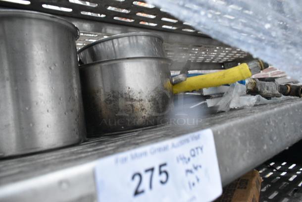 Chrome Finish 5 Tier Wire Shelving Unit on Commercial Casters w/ Contents Including Pizza Pan Rack, Metal Stock Pots, Gas Hoses, Round Metal Pans. BUYER MUST DISMANTLE. PCI CANNOT DISMANTLE FOR SHIPPING. PLEASE CONSIDER FREIGHT CHARGES. - Image 3 of 11