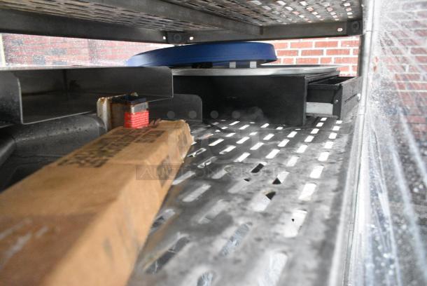Chrome Finish 5 Tier Wire Shelving Unit on Commercial Casters w/ Contents Including Pizza Pan Rack, Metal Stock Pots, Gas Hoses, Round Metal Pans. BUYER MUST DISMANTLE. PCI CANNOT DISMANTLE FOR SHIPPING. PLEASE CONSIDER FREIGHT CHARGES. - Image 7 of 11