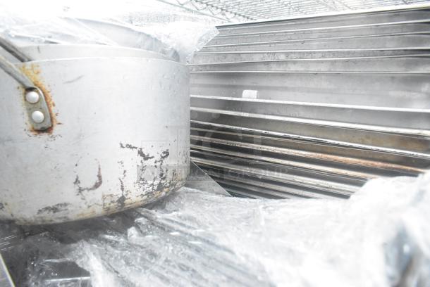 Chrome Finish Wire Shelving Unit w/ Contents Including Poly Dough Bins, Round Metal Baking Pans, Stainless Steel Drop In Bins. BUYER MUST DISMANTLE. PCI CANNOT DISMANTLE FOR SHIPPING. PLEASE CONSIDER FREIGHT CHARGES. - Image 2 of 6