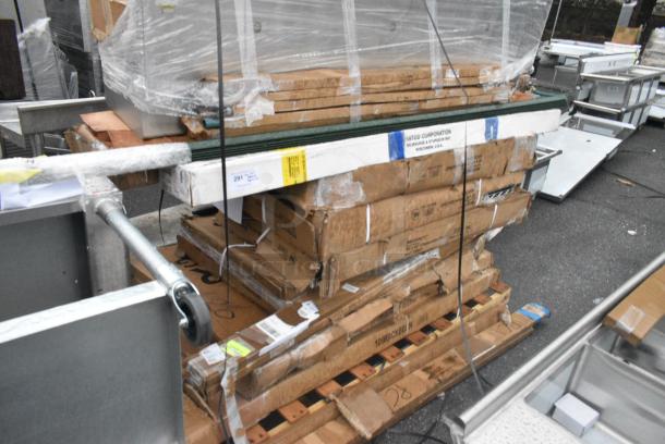 20 BRAND NEW SCRATCH AND DENT! Items Including Regency 460EGPC54 NSF 54" Green Epoxy Mobile Shelving Post, 2 Box 460EC2448 Regency 24" x 48" NSF Chrome Wire Shelf, 109RACKECON Steelton 20 Pan End Load Bun / Sheet Pan Rack - Unassembled, 600WS1860HD Regency 16 Gauge Stainless Steel 18" x 60" Heavy Duty Wall Shelf, 600TSB3060S Regency 30" x 60" 16-Gauge Stainless Steel Commercial Work Table with 4" Backsplash and Undershelf, 2 Brooms. 20 Times Your Bid! - Image 1 of 14