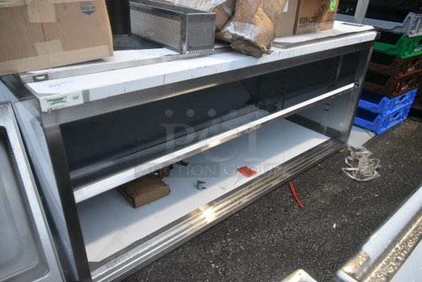 BRAND NEW SCRATCH AND DENT! Regency 600EBT3072D 30" x 72" 16 Gauge Type 304 Stainless Steel Enclosed Base Table with Sliding Doors and Adjustable Midshelf - Image 1 of 3