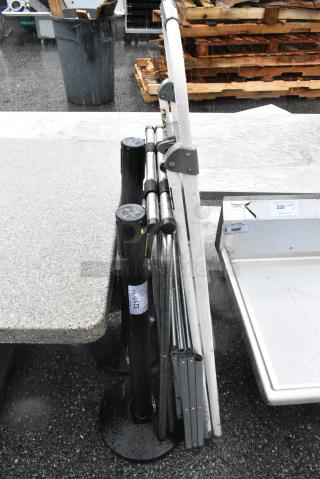 4 BRAND NEW SCRATCH AND DENT! Items Including 2 Stanchions, Metal Serving Tray and Folding Table. 4 Times Your Bid!