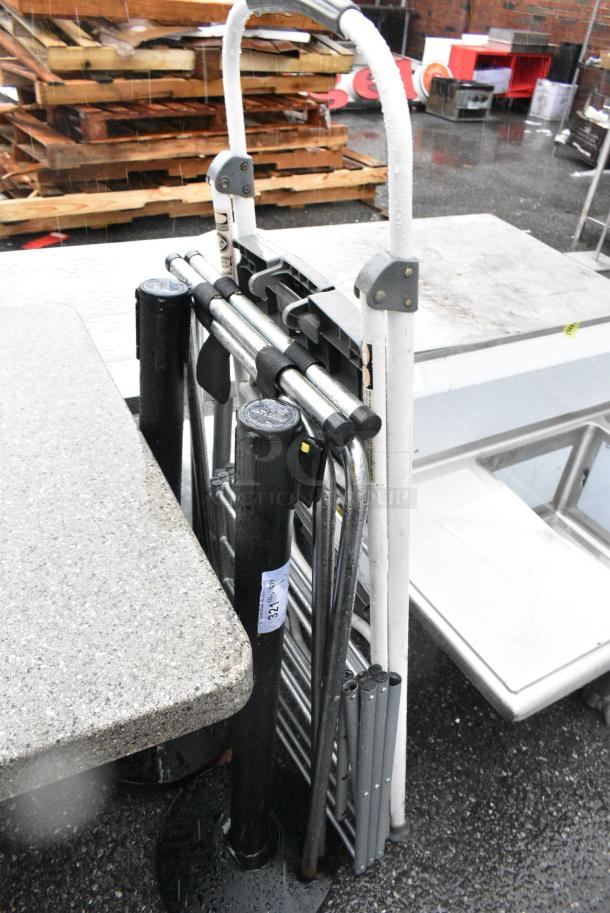 4 BRAND NEW SCRATCH AND DENT! Items Including 2 Stanchions, Metal Serving Tray and Folding Table. 4 Times Your Bid! - Image 2 of 3