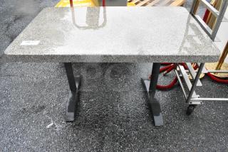 Stone Pattern Table on 2 Metal Table Base.