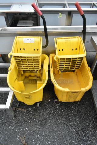 2 Yellow Poly Mop Bucket w/ Wringing Attachment. 2 Times Your Bid!