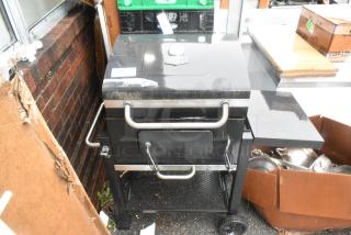 Black Metal Outdoor Portable Grill.