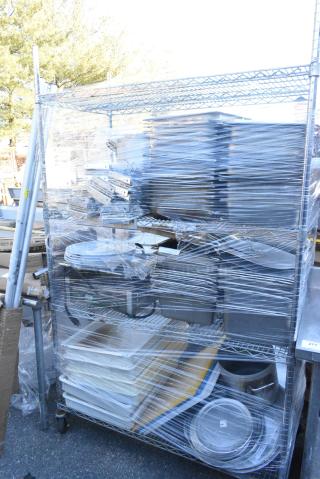Chrome Finish Wire Shelving Unit w/ Contents Including Poly Dough Bins, Round Metal Baking Pans, Stainless Steel Drop In Bins. BUYER MUST DISMANTLE. PCI CANNOT DISMANTLE FOR SHIPPING. PLEASE CONSIDER FREIGHT CHARGES.
